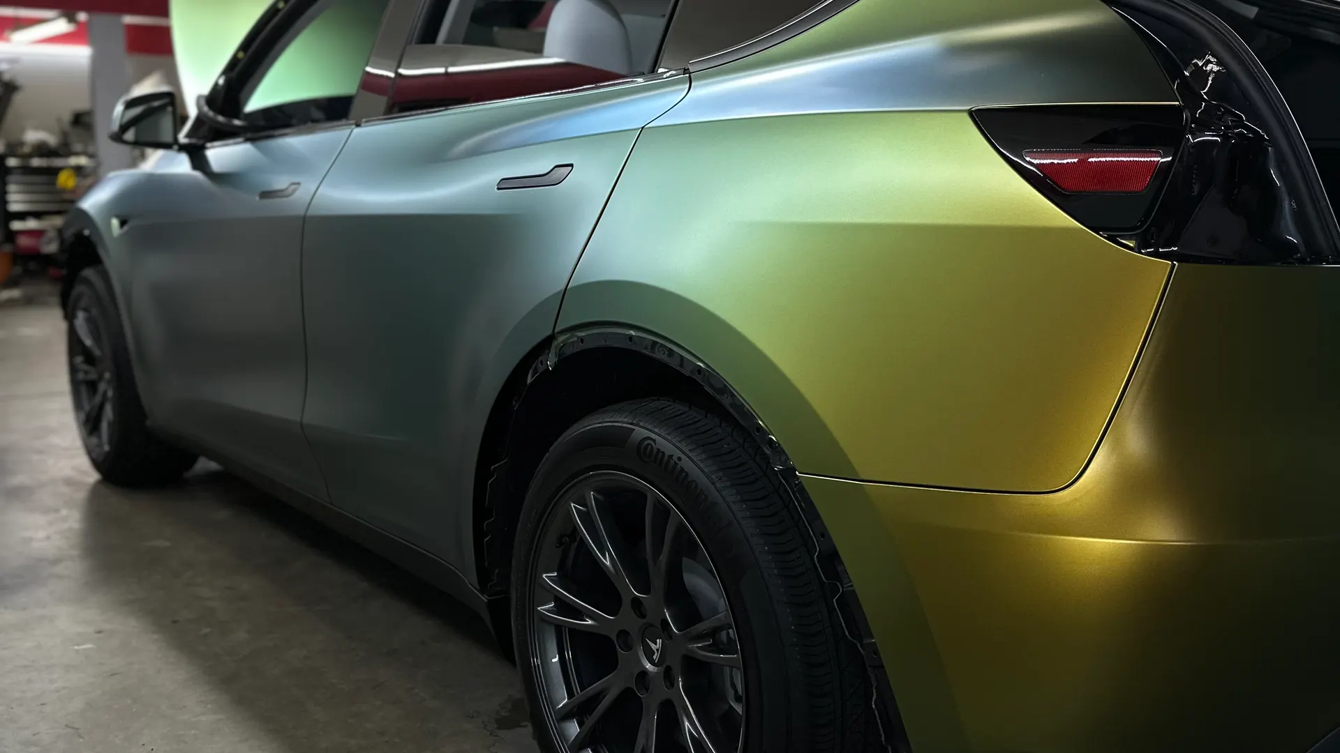 Tesla Model Y in a satin gold wrap — Oka's Car Care, Mountain View