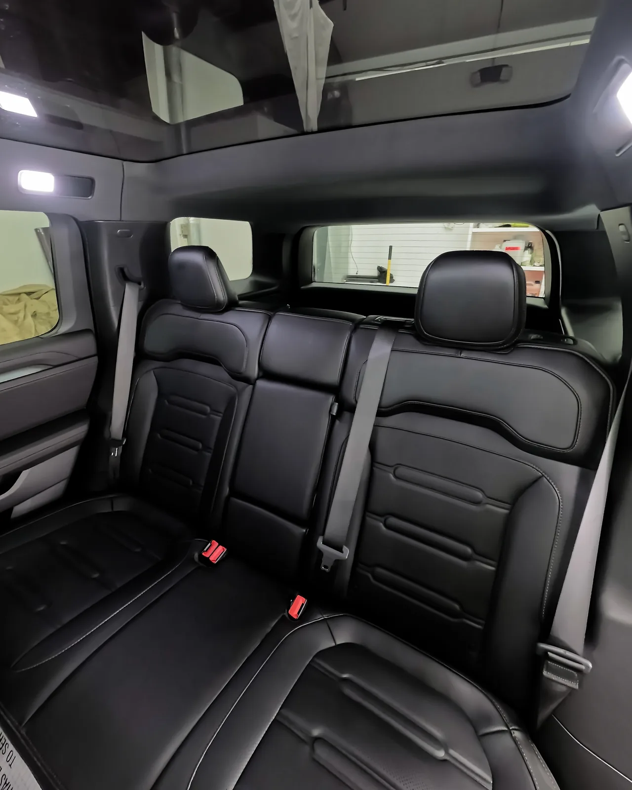 Rear seats of the Rivian R2 after cleaning — Oka's Car Care, Mountain View