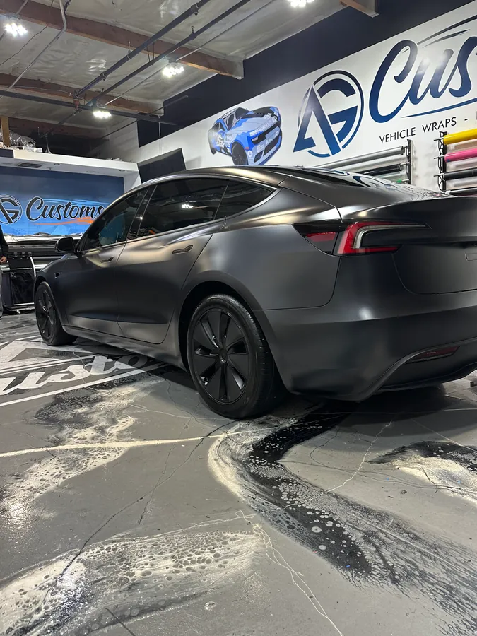 Tesla Model 3 in satin black, rear three-quarter — Oka's Car Care, Mountain View