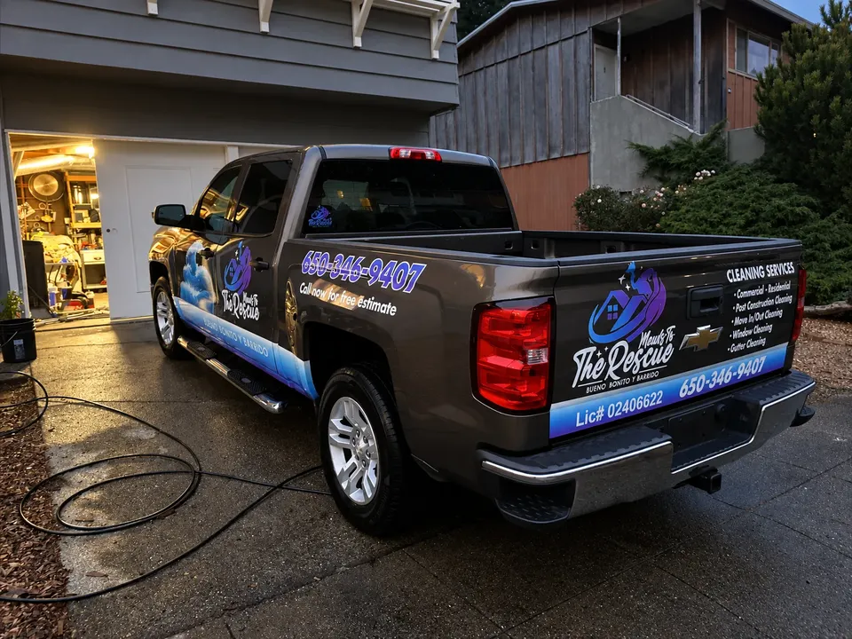 Chevrolet Silverado with a commercial wrap, at dusk, wraps gallery, Oka's Car Care, Mountain View