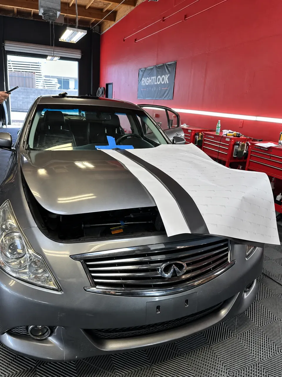 Infiniti hood being wrapped in matte grey, wraps gallery, Oka's Car Care, Mountain View